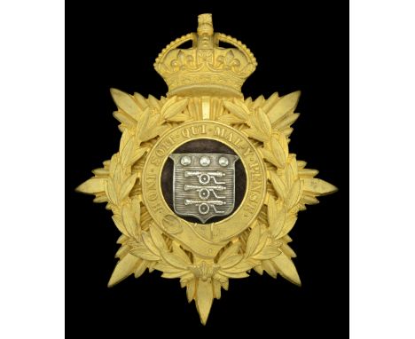 The Royal Army Ordnance Corps Oï¬ƒcer’s Helmet Plate 1901-12. A good example in silver and gilt, the crowned eight-pointed st