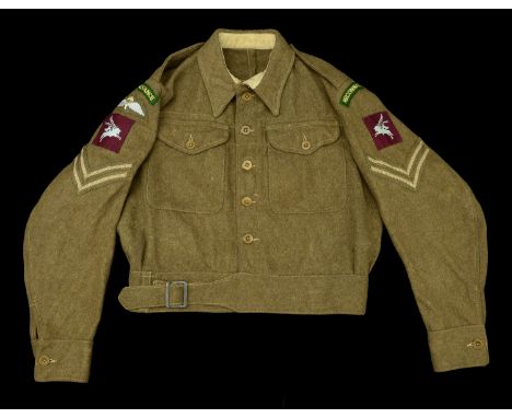 A Second War 1940 Pattern Battle Dress Blouse. A Second War 1940 pattern Battle Dress Blouse, heavy green cloth with tailors 