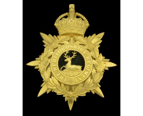 The Hertfordshire Regiment Oï¬ƒcer’s Helmet Plate 1905-12. A scarce good example in gilt, the crowned eight-pointed star patt