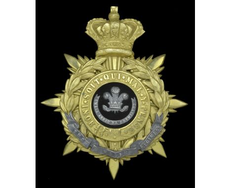 The Welsh Regiment Officer’s Helmet Plate c. 1882-1901. A fine quality example being a crowned eight pointed star with laurel