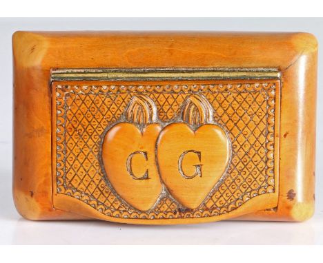 A 19th century boxwood snuff box, French, circa 1820 Of rounded rectangular form, hollowed from the solid, the hinged lid wit