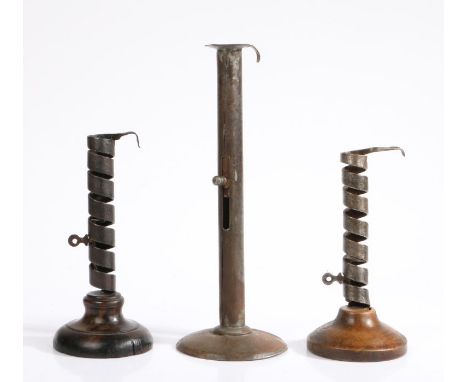 Two late 18th century steel/iron spiral and fruitwood base candlesticks, FrenchEach with a stem formed from a coiled band, th