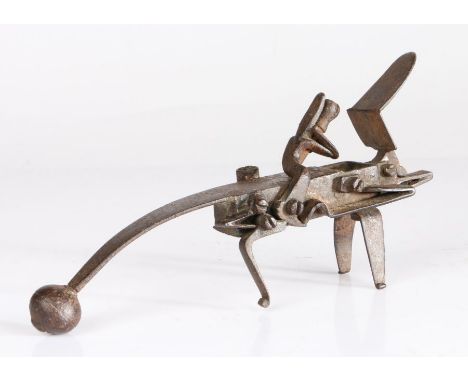 An 18th century steel tinder pistol or table strike-a-light, probably GermanThe tapering and curved flat 'butt' with ball ter
