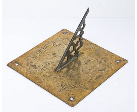 A 19th century brass engraved sundial, EnglishWith decorative gnomon, the square back plate engraved with an eight-point comp