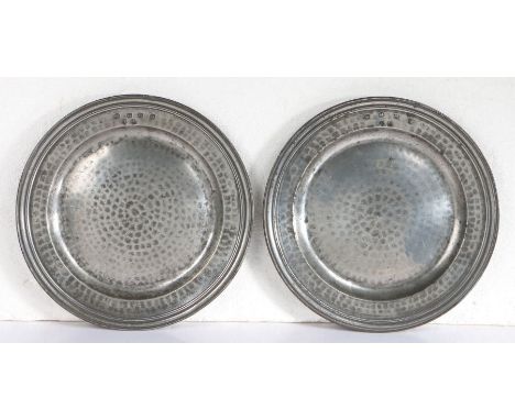 A fine pair of William & Mary pewter multi-reed plates, circa 1690Each all-over hammered, with hallmarks to front rim for Ben