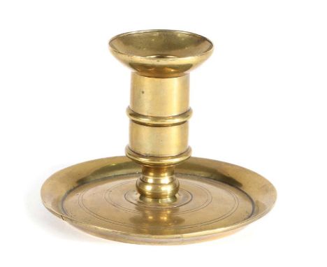                        A good George I/II brass ‘lantern’ candlestick, circa 1720-40                         The straight si