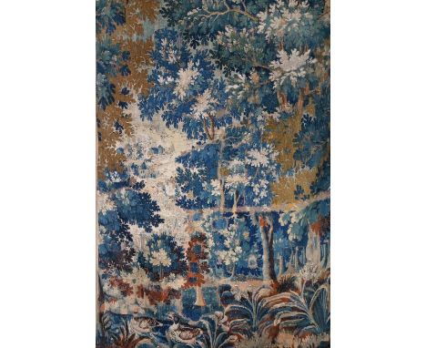 A 17th century verdure tapestry panel, Flemish


Woven in coloured wools with silk highlights, depicting ducks on a pond befo