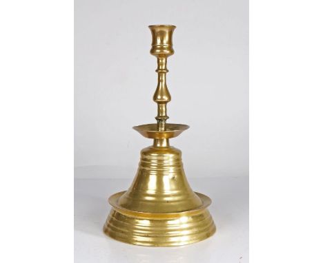 A large 'bell-bottom' socket candlestick, In the mid-16th century, English, circa 1550-1600 mannerHaving an unusual  'tulip-s