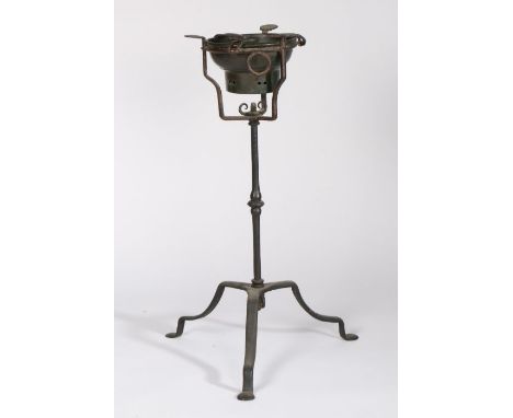 A rare wrought iron 'campaign' standing brazier, circa 1700Having an iron ring inset with a pierced brazier pan, the ring fit