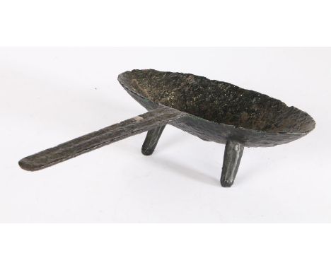 A particularly small and documented early 18th century cast iron grisset, English, possibly Sussex or Kent, circa 1700Of typi