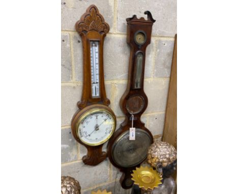 A Cicceri and Co, London wheel barometer and a late Victorian carved oak barometer, larger height 109cm