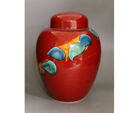 A large Poole Volcano design jar and cover, 32cm high