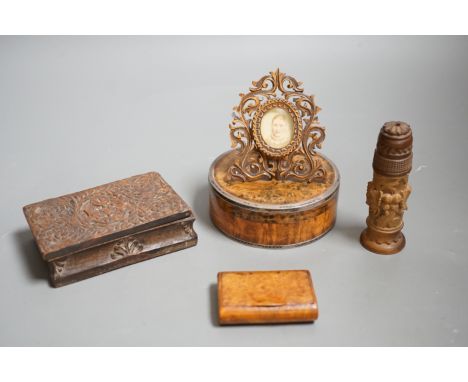A 19th century circular white metal mounted burr wood snuff box and assorted small carvings