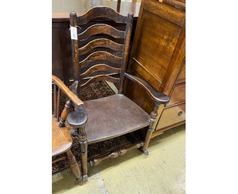 A 19th century ash and elm ladder back rocking elbow chair, width 66cm, depth 40cm