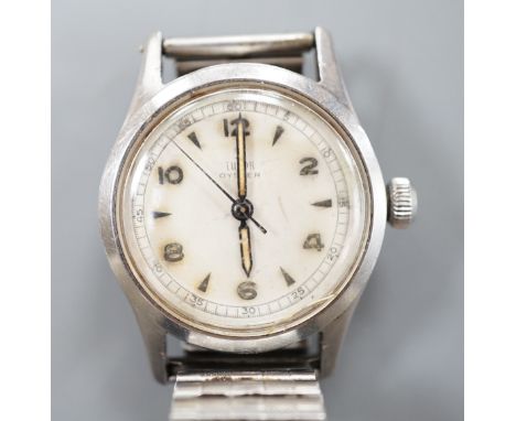 A gentleman's stainless steel Tudor Oyster manual wind wrist watch, with baton and Arabic numerals, on associated flexible br