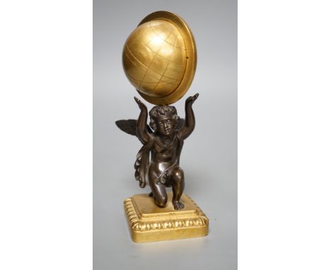 A late 19th century bronze and ormolu model of a cherub supporting a globe, 16cm