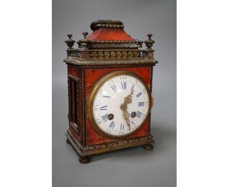 A 19th century French tortoiseshell mantel clock. 24cm high
