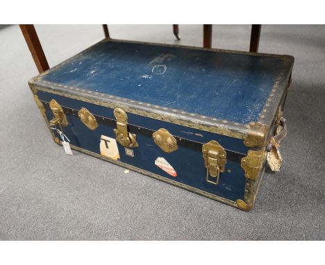 A vintage brass bound travelling trunk, length 91cm, depth 51cm, height 33cm