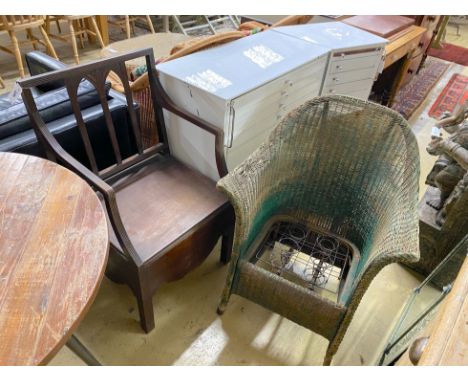 A green painted Lloyd Loom armchair and a Regency mahogany commode chair