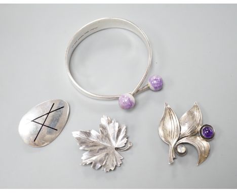 Four items of 20th century Scandinavian white metal jewellery, including a brooch and amethyst quartz set bangle by Hans Hans
