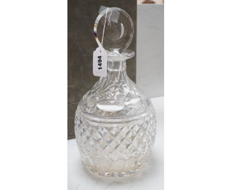 A Harrods cut glass decanter in original case, decanter and stopper, 33cms high