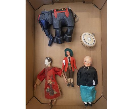 A collection of collectors items to include 3 antique dolls, an Indian carved hardwood elephant puppet and a small oval lidde