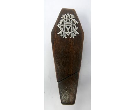 A 19th century mahogany snuff box in the form of a coffin, with silver mount 