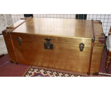 A contemporary gilt trunk, H.45 W.50 D.98cm 