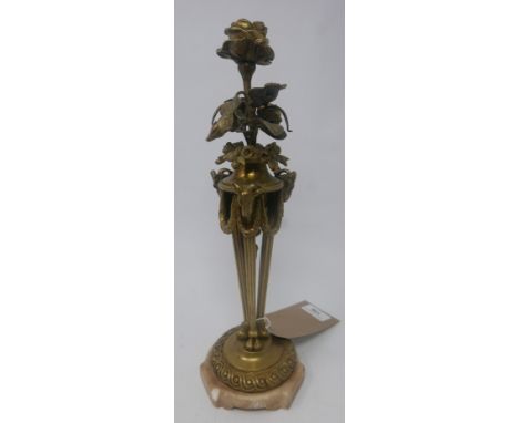 A neo classical style candelabra with floral decoration to sconce standing on a marble base. H.34cm 