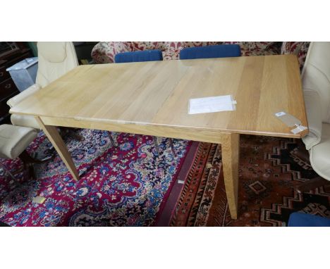 A modern Ercol extending dining table with one leaf, H.74 W.192 D.85cm 