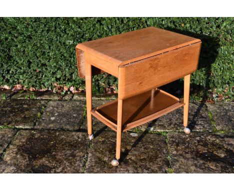 A mid 20th century Ercol style oak drinks trolley, H.73 W.70 D.48cm 