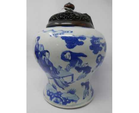 A 19th century Chinese blue &amp; white porcelain vase, decorated with mothers and children playing, later cut down and now w