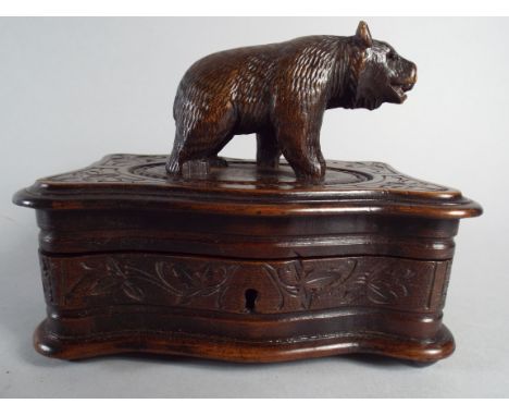 A 19th Century Black Forest Linden Wood Trinket Box, The Top Decorated with a Carved Bear.16x10x12cm 