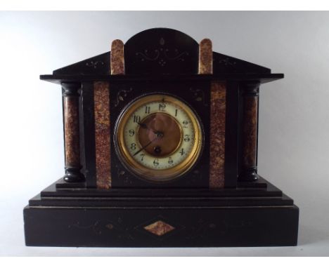 A French Slate and Marble Mantel Clock of Architectural Form. 37cm Wide, 30cm High 