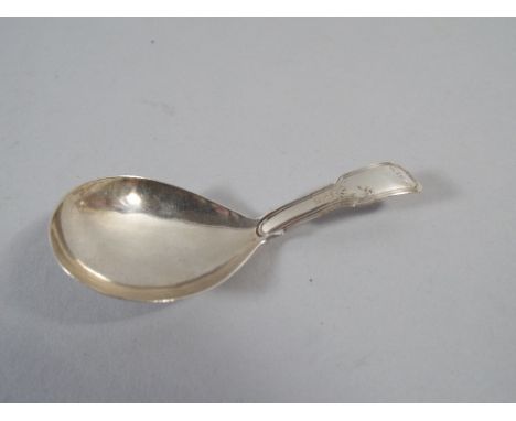 A Georgian Silver Caddy Spoon. Monogrammed. Hallmarks Birmingham 1797 by Joseph Willmore. 13gms. 
