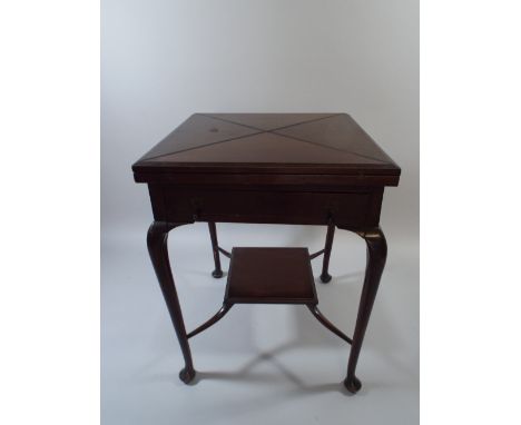 An Edwardian Mahogany Envelope Games Table with Beize Playing Surface and Four Wells. Single Drawer. Turned Supports and Stre