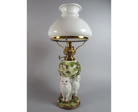 A Novelty Table Lamp on the Form of Three Owls Supporting an Oak Covered Ball. (Shade AF, One Owl Missing One Glass eye). 40c