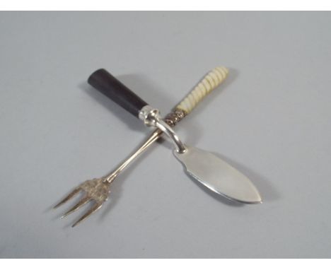 A Butter Spade with Ebonised Wooden Handle (Hallmark Rubbed) and a Silver Fork with Mother of Pearl Handle by George Unite. 