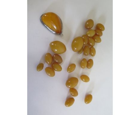 A butterscotch amber type loose beads, 52 grams, approx, plus silver amber pendant 