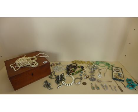 A collection of assorted costume and other jewellery including some silver in a satin wood box 