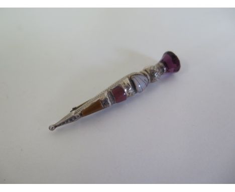 A silver Charles Horner Scottish style brooch set with hard stones, 6.5cm long in generally good condition 