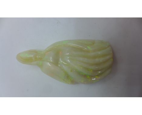 An opal carving of the Madonna - 6.5cm x 3cm - approx 130cts 