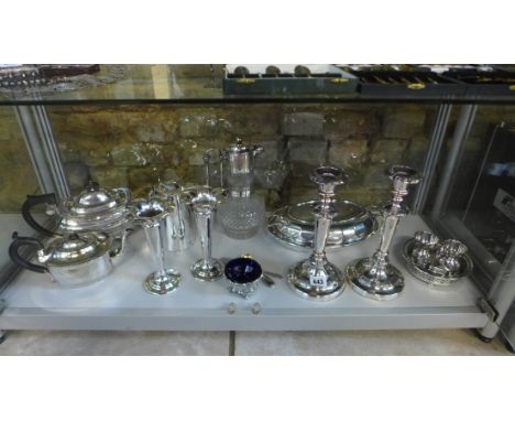 A collection of silver plated ware including pair for candlesticks, vases, claret jug etc, generally good condition 