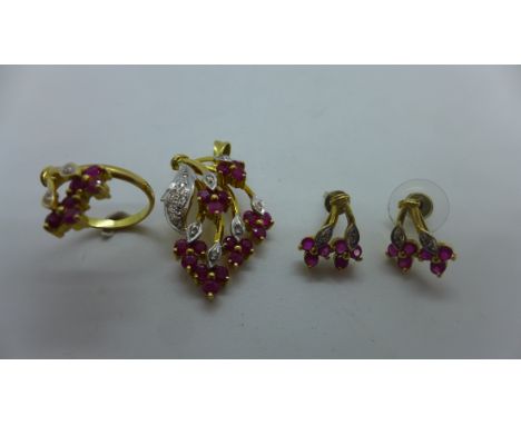 A suite of 18ct yellow and white gold diamond and ruby jewellery comprising pendant, earrings and ring in the form of a spray