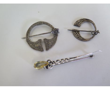 Three Scottish silver brooches, one stamped IONA 