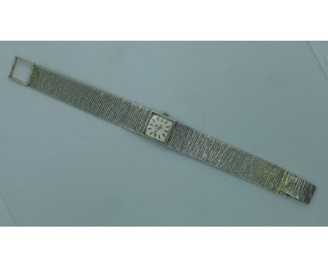 A ladies 9ct white gold Omega wristwatch and strap, case and strap fully hallmarked, case weight approx 33 grams, total weigh