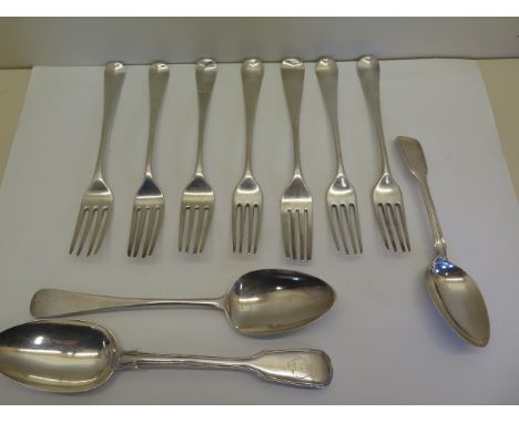 A quantity of Georgian silver flatware comprising of seven table forks, tablespoon and dessert spoon, various dates and maker