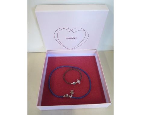 A Pandora silver and leather bracelet and necklace 