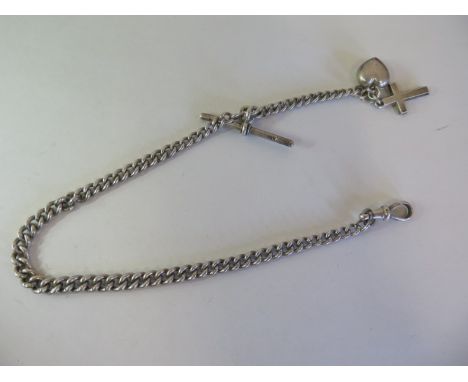 A graduated silver Albert watch chain with T-bar and dog clip, length 41.5cm, weight approx 27.2 grams, lion passant stamped 
