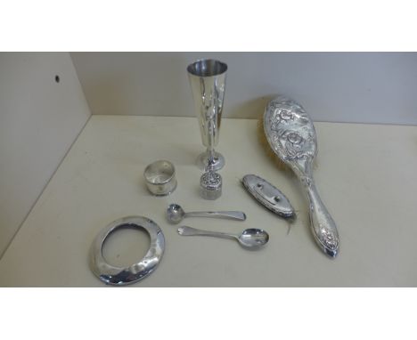 A small collection of silver items including vase, napkin ring, brush etc, weighable silver approx 4.9 troy oz, plus silver b